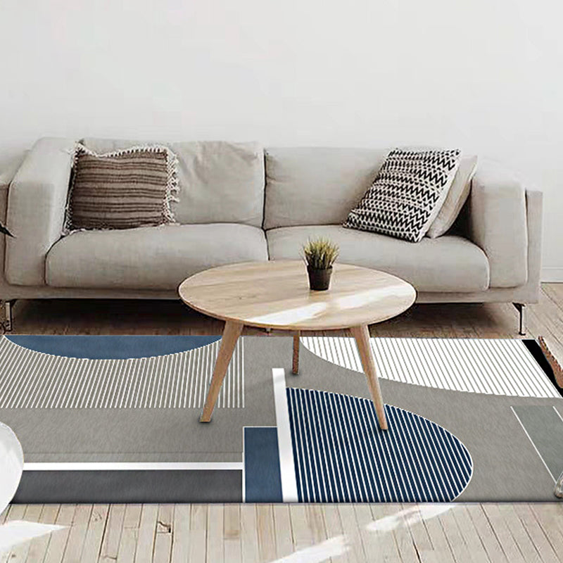 Moderner Teppich für das Wohnzimmer in grauer Farbe mit blockartigen Streifen in unregelmäßiger Form gedruckter Teppich Polyester rutschfeste Rückseite Teppich