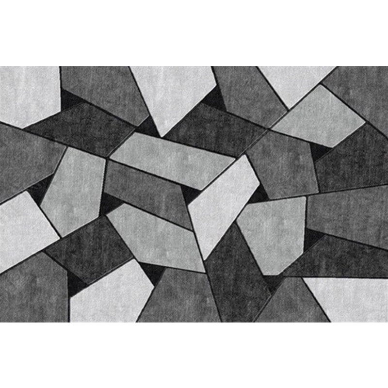 Moderner Wohnzimmerteppich in Schwarz und Grau, Farbblock, unregelmäßige Form, bedruckter Teppich, Polyester, maschinenwaschbar.