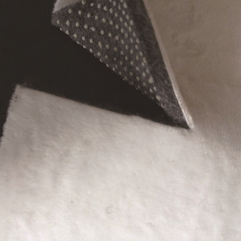 Moderner Wohnzimmerteppich in Schwarz und Grau, Farbblock, unregelmäßige Form, bedruckter Teppich, Polyester, maschinenwaschbar.