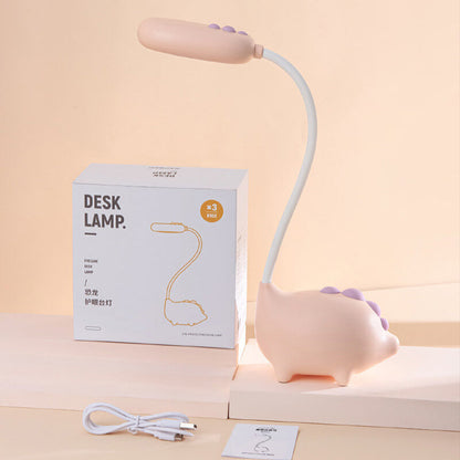 Wiederaufladbare LED-Schreibtischlampe mit Cartoon Dinosaurier Augenpflege
