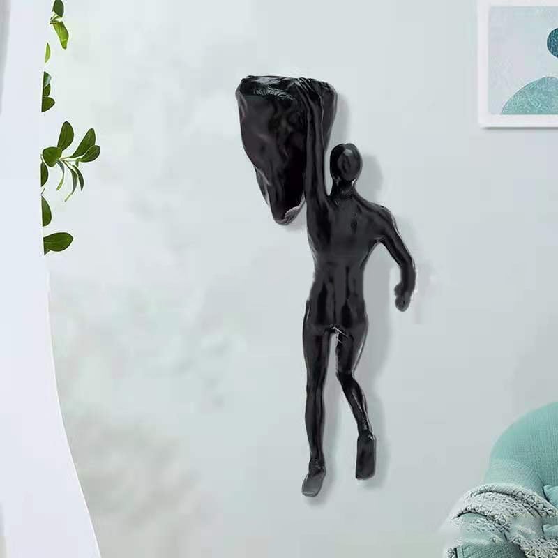 Kletterwand hängende Statuen