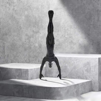 Kletterwand hängende Statuen
