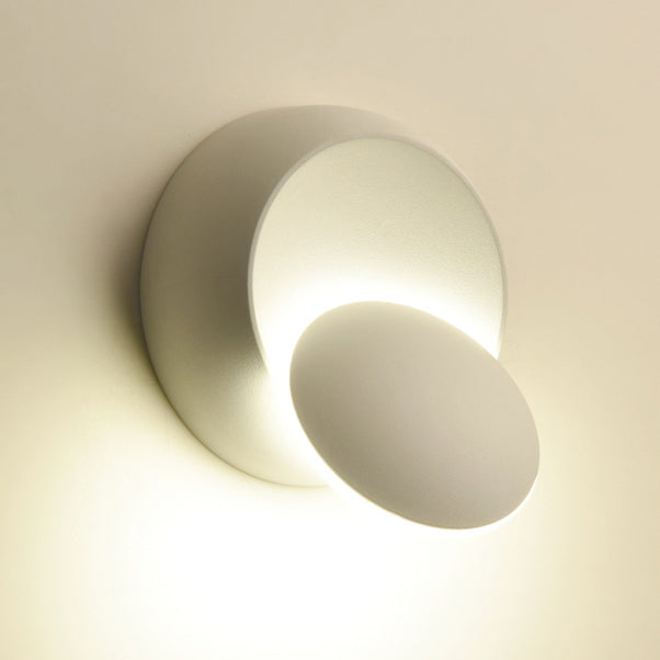 Zeitgenössische nordische Eisenrunde Eclipse rotierbare LED-Wandleuchte für Nachttisch