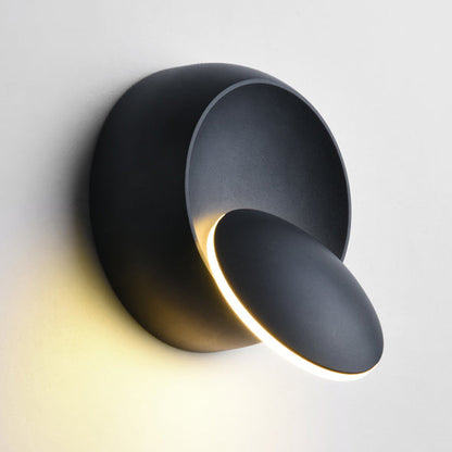 Zeitgenössische nordische Eisenrunde Eclipse rotierbare LED-Wandleuchte für Nachttisch
