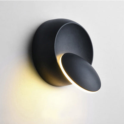 Zeitgenössische nordische Eisenrunde Eclipse rotierbare LED-Wandleuchte für Nachttisch
