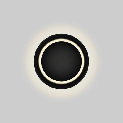 Zeitgenössische nordische Eisenrunde Eclipse rotierbare LED-Wandleuchte für Nachttisch