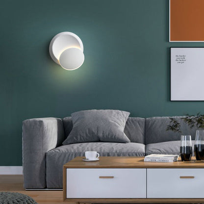 Zeitgenössische nordische Eisenrunde Eclipse rotierbare LED-Wandleuchte für Nachttisch