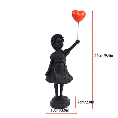 Skulptur eines Mädchens mit Ballon im Banksy-Stil zur Tischdekoration und kreativen Wohnzimmerschmuck