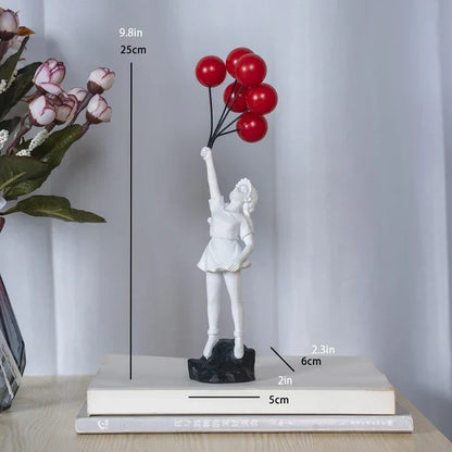 Skulptur eines Mädchens mit Ballon im Banksy-Stil zur Tischdekoration und kreativen Wohnzimmerschmuck