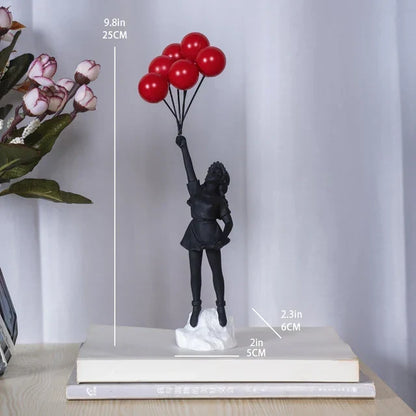 Skulptur eines Mädchens mit Ballon im Banksy-Stil zur Tischdekoration und kreativen Wohnzimmerschmuck