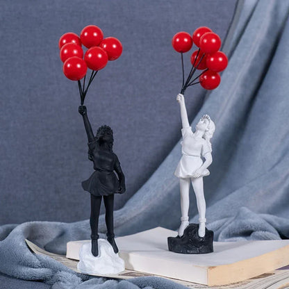 Skulptur eines Mädchens mit Ballon im Banksy-Stil zur Tischdekoration und kreativen Wohnzimmerschmuck