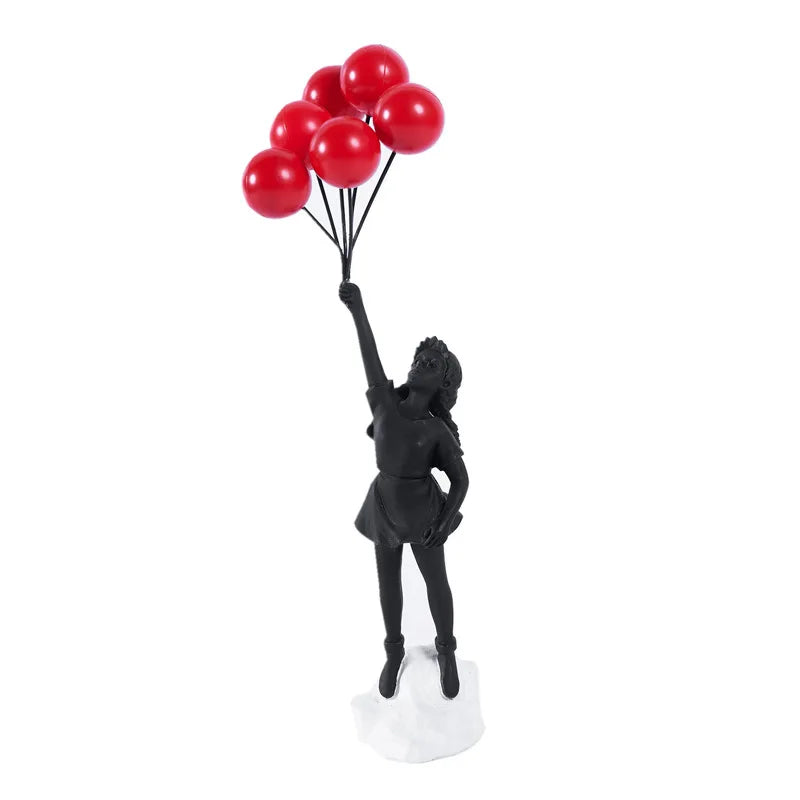 Skulptur eines Mädchens mit Ballon im Banksy-Stil zur Tischdekoration und kreativen Wohnzimmerschmuck