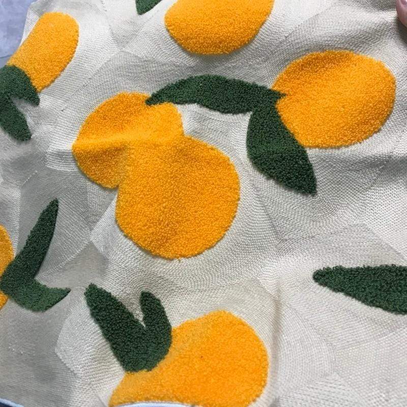 Orange gesticktes dekoratives Kissen